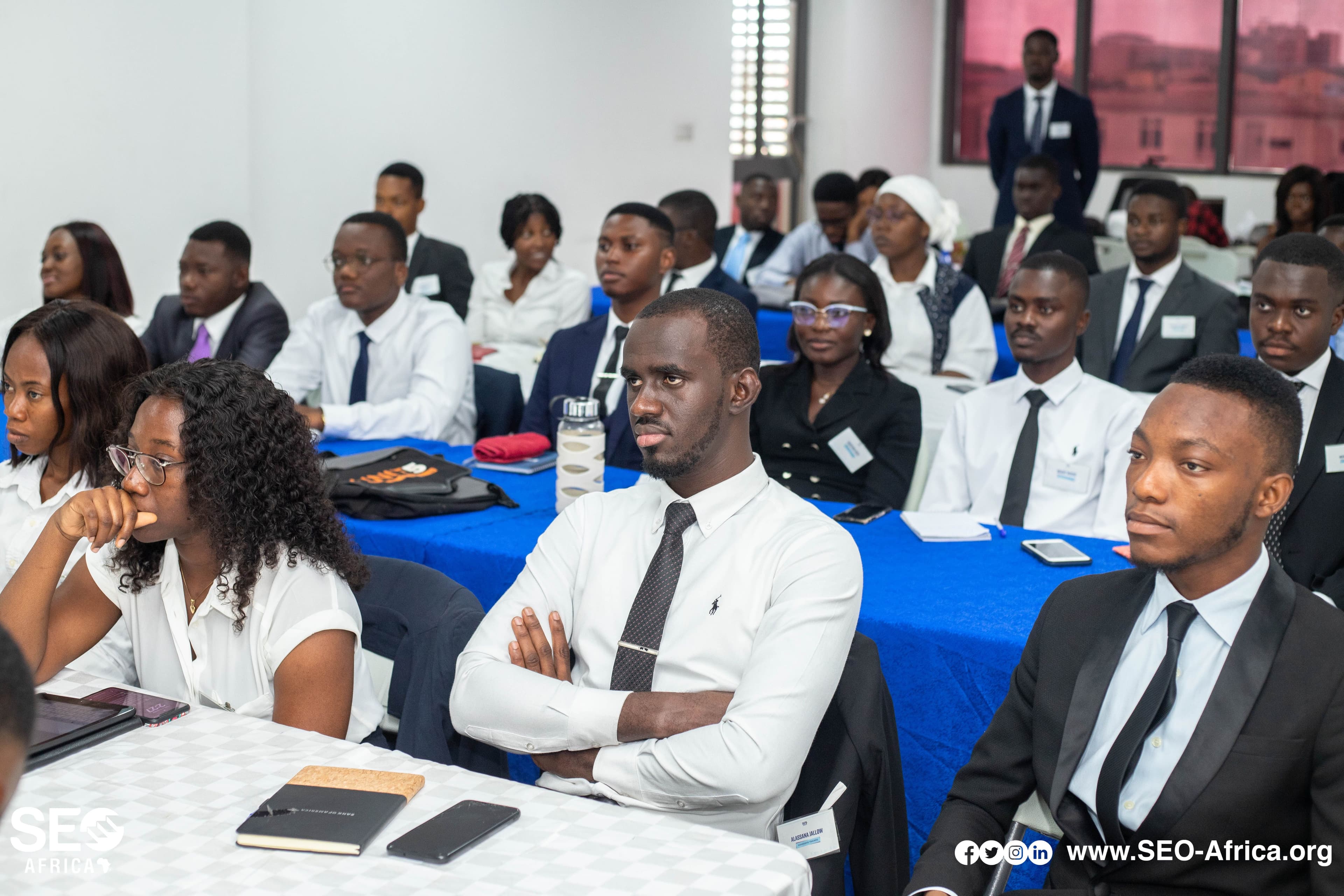 Professional African business people collaborating with tablet